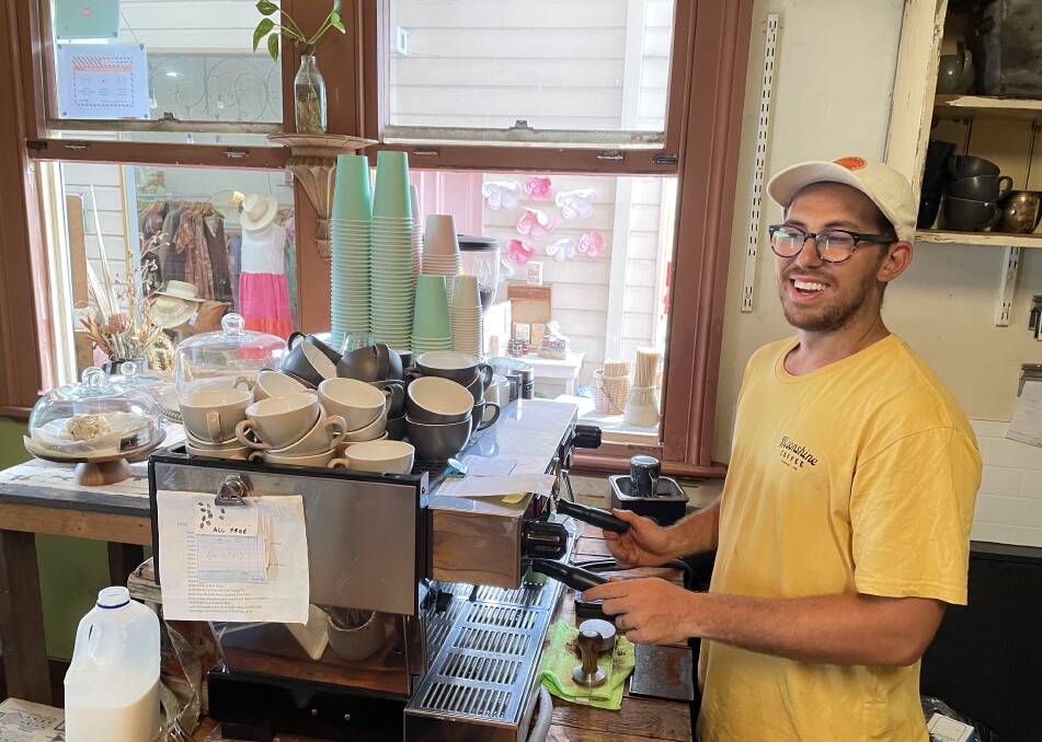 Service: Josh Pirrotta makes coffees at Cafe on Cusack on Friday, as the cafe goes takeaway only in the wake of vaccine mandates.