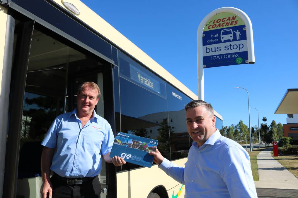New route ready: Logan MP Linus Power with Logan Coaches' Queensland manager Peter Bowerman.