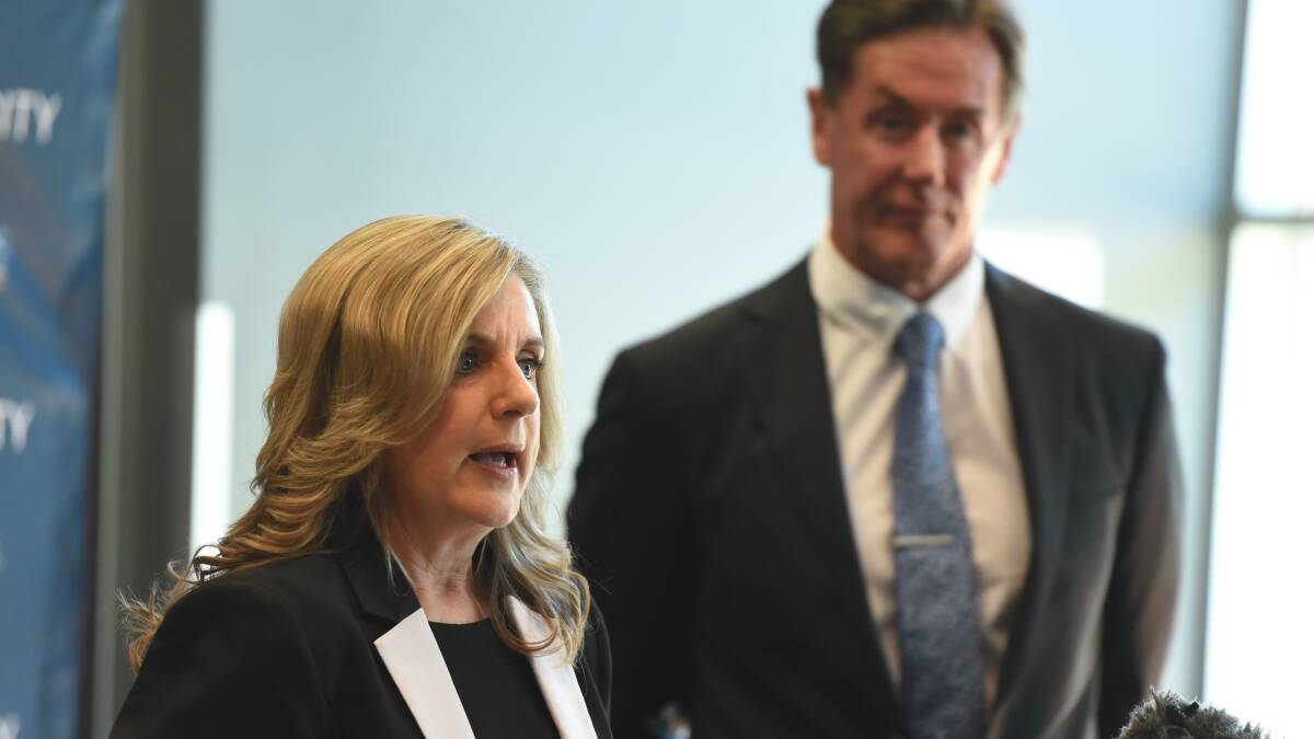 Budget briefing: City Governance Committee chair Lisa Bradley and Logan mayor Darren Power at a press conference this morning. Photo: Matt McLennan