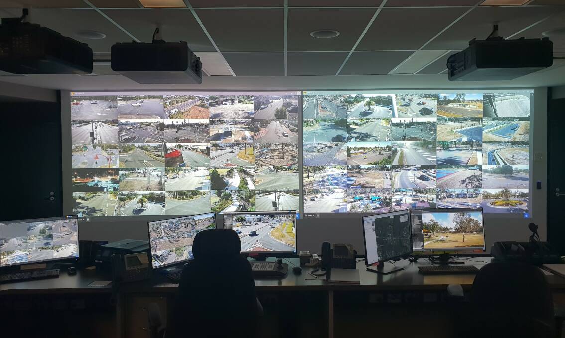 We are watching: Logan City Council's safety camera control room.