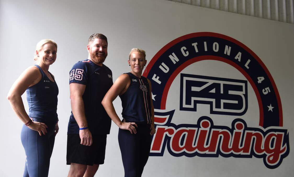 Workouts on a screen: F45 studio manager Carlee Hick and owners Michael and Krystal Manley will offer remote gym sessions to members via Facebook live.