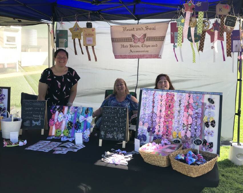 Sales: A virtual market will help stallholders connect with customers via social media. Robyn Scott, Tania Hird and Tara Hird are pictured.
.