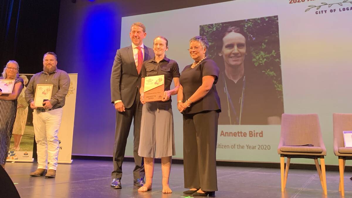 Top citizen: Annette Bird receives her Australia Day award from Interim Administrator Tamara O'Shea and State Development Minister Cameron Dick. 