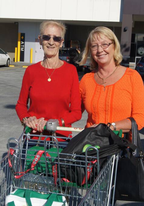 Different: Patricia Jeffery and Michelle Dell say other shoppers' panic buying has changed their habits as coronavirus takes its toll. Photo: Matt McLennan