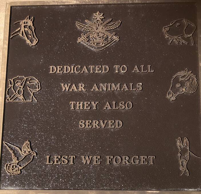 Poignant: The plaque on the memorial.