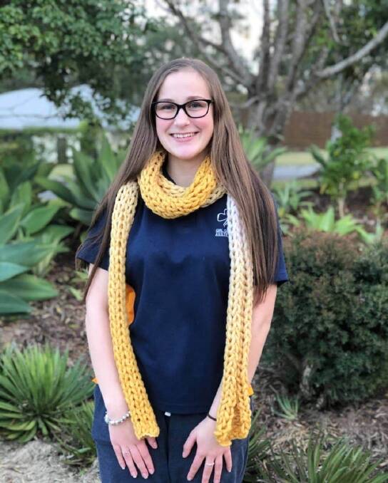Raising money: Scarves to fight cancer: Rebecca Fillery has knitted scarves to support the Cancer Council.