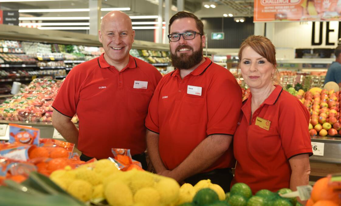 Grand opening: Coles state general manager Jerry Farrell, store manager Steve Kwiatkowski and regional manager Tanya Travis at the opening of the Flagstone store in March.