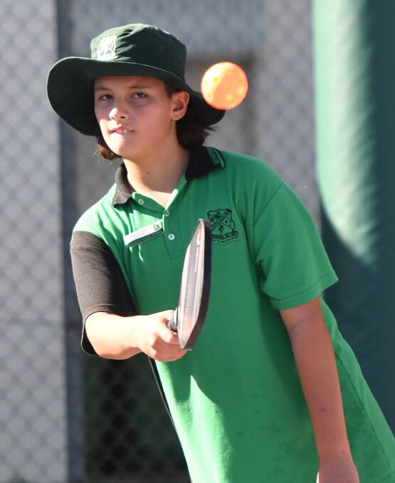 Students try pickleball at Woodhill