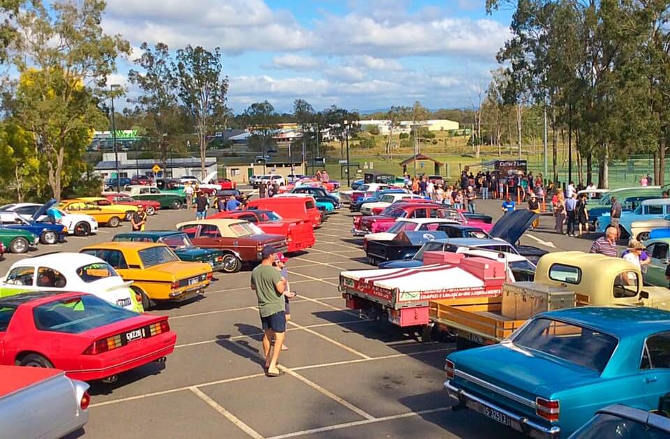 Petrol head heaven: The carpark was packed with classics at JImboomba on Sunday.