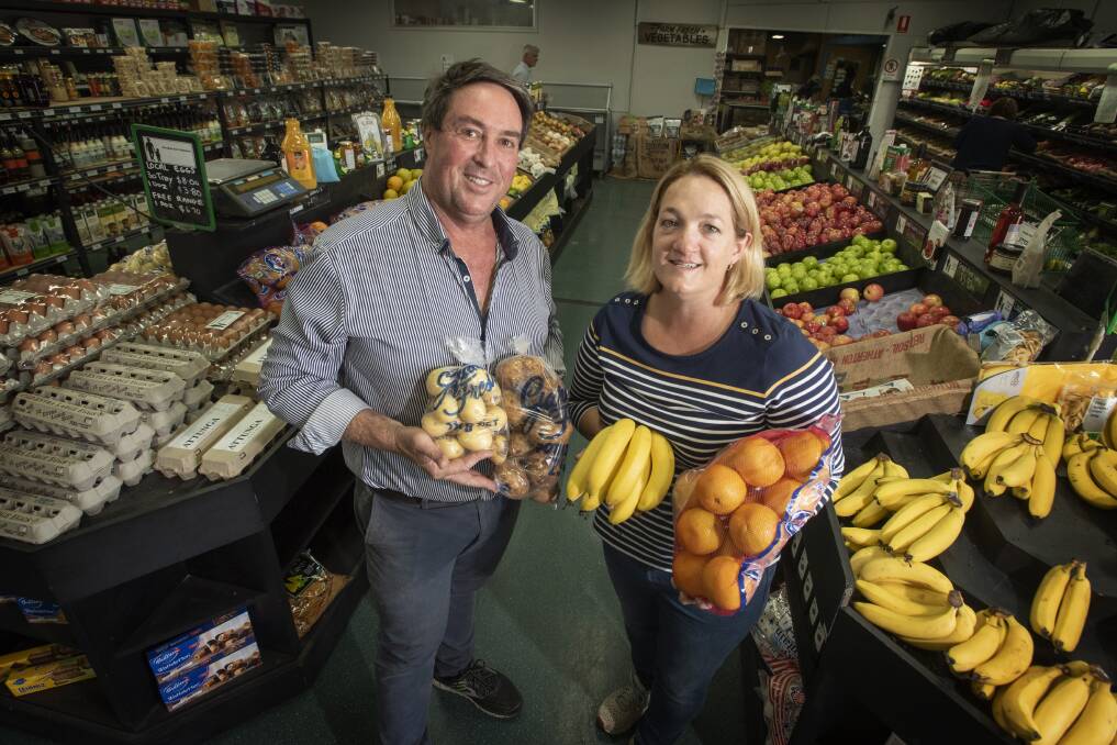 KEEPING UP: Farmer Bob's owners Brendon and Vicki North have been kept busy by the high demand for fresh produce. Photo: Peter Hardin 180320PHF004. 
