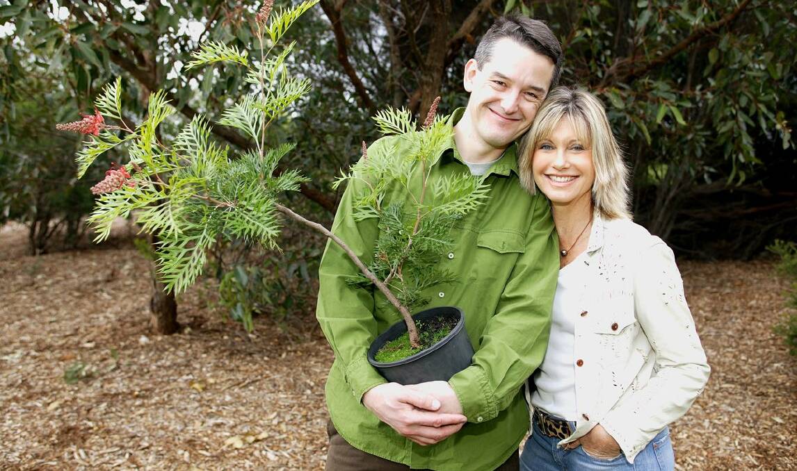 TEAMWORK: Olivia Newton-John and her friend Jon Dee co-founded National Tree Day in 1996. Picture: Twitter/@JonDeeOz