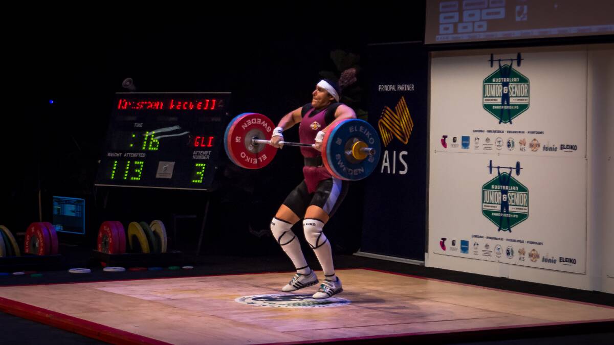 IN ACTION: Kristen Wadell during her 113kg clean and jerk lift at the Australian Weightlifting Championships. Photo: Field Media.