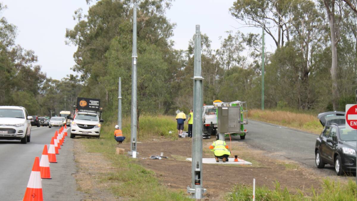 INSTALLATION: Point-to-point cameras are being installed at Jimboomba and Park Ridge South. Photo: Georgina Bayly