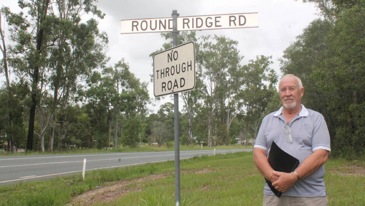 LIGHTING: Terry Williams has been campaigning for improved safety at the Round Ridge Road intersection. Photo: Georgina Bayly