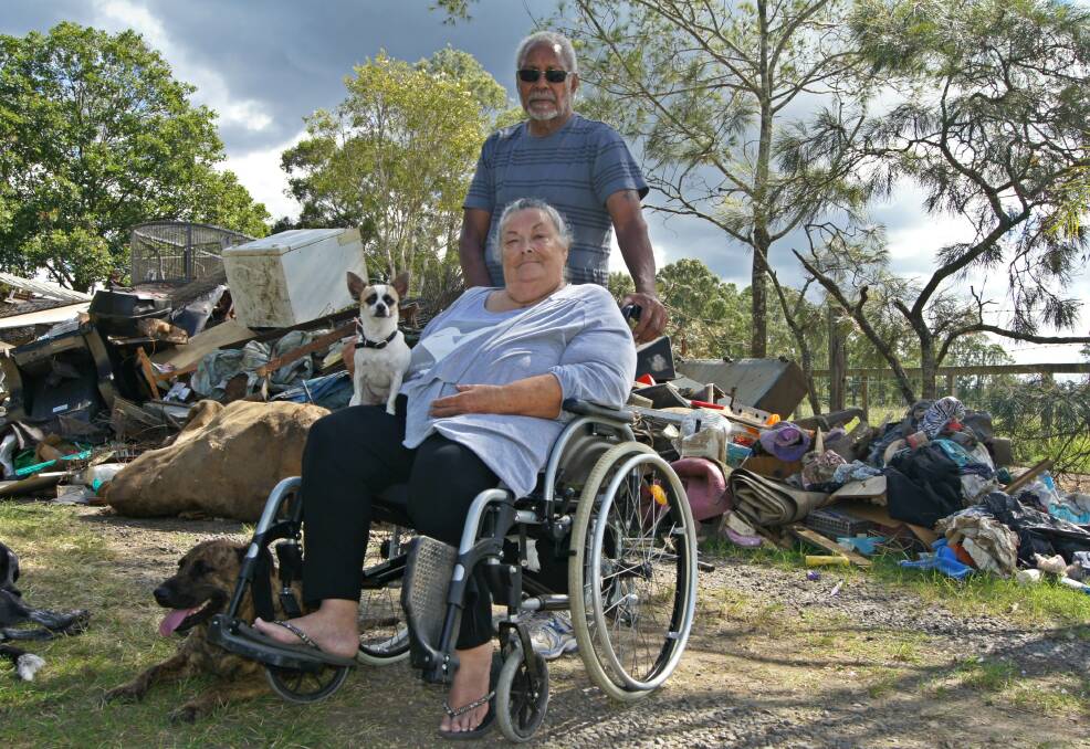 HEARTACHE: Lynda and John O'Hello have been devastated by the recent flood and are yet to re-enter their home in North Maclean. Photo: Georgina Bayly