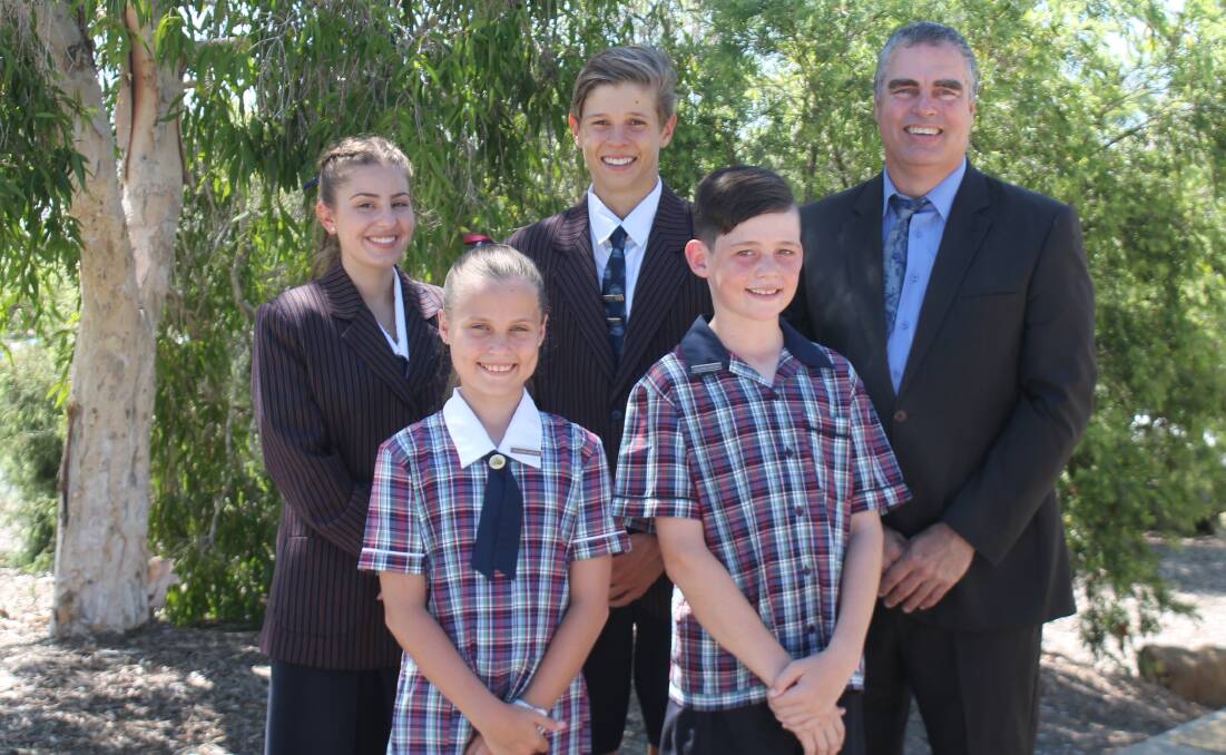 Year 12 captains Angelina Kardum and Matthew Creevey and year 6 captains Jacob Marks and Talissa Griffiths with head of secondary Stephen Adair. Photo: Georgina Bayly